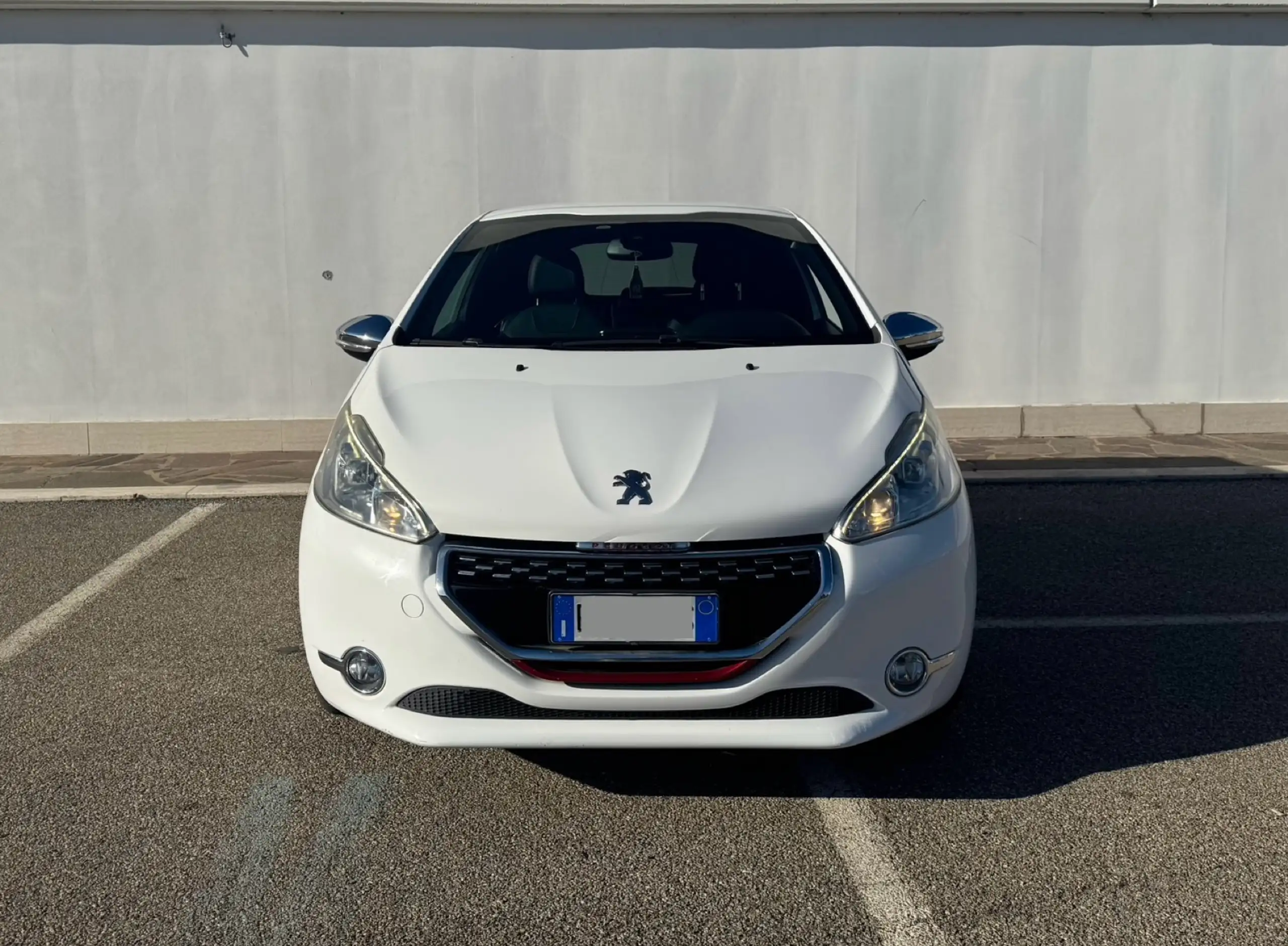 Peugeot - 208