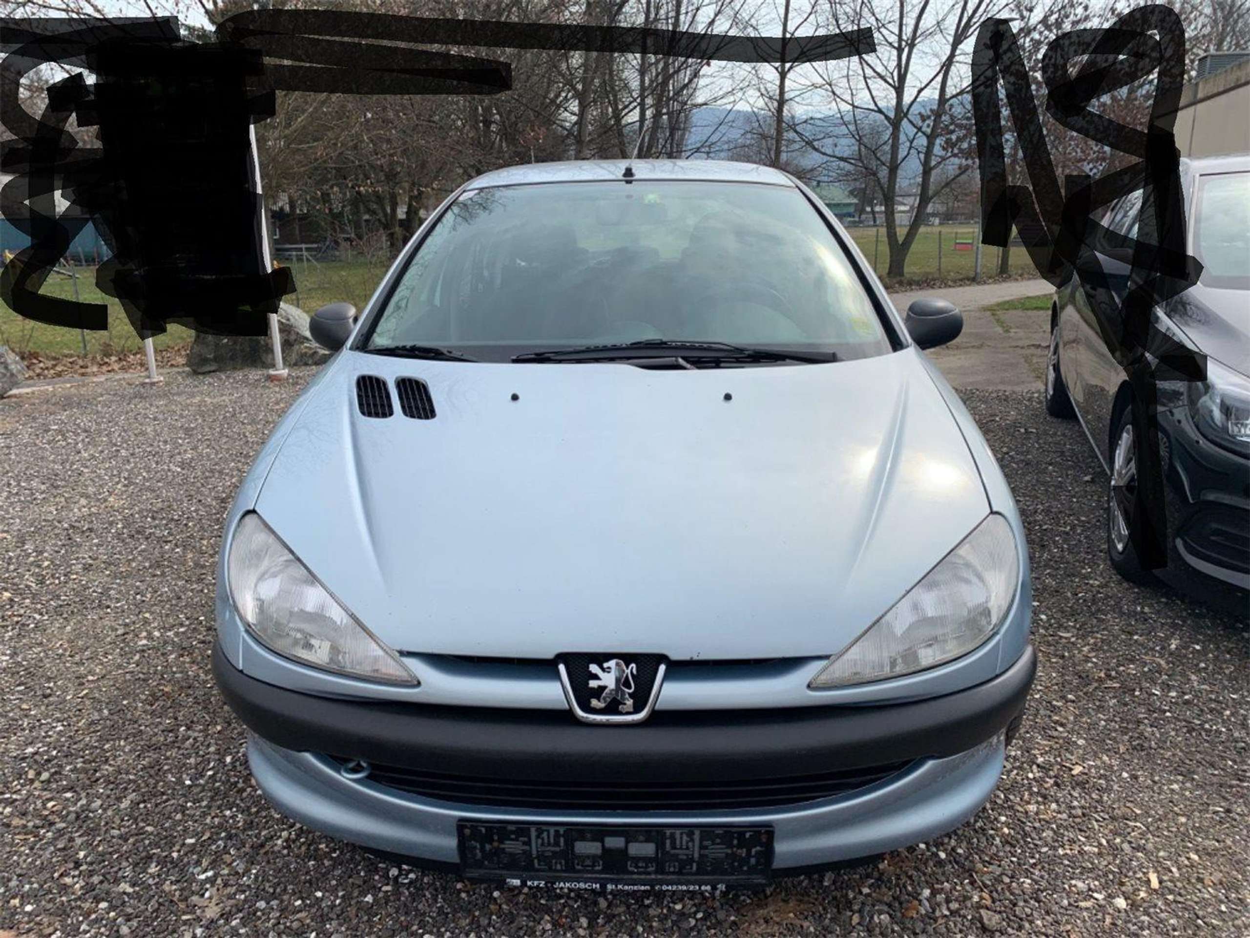 Peugeot - 206