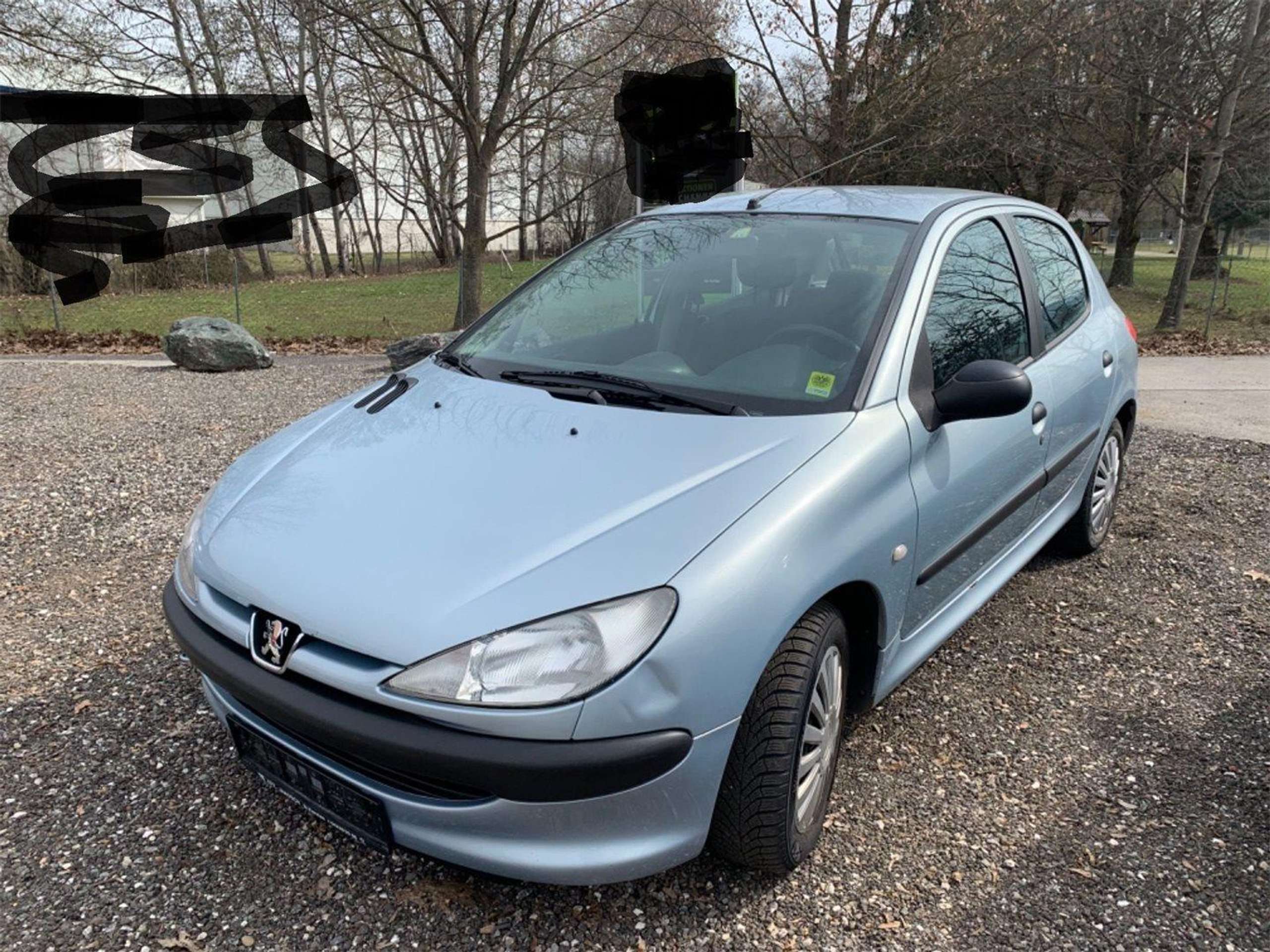 Peugeot - 206