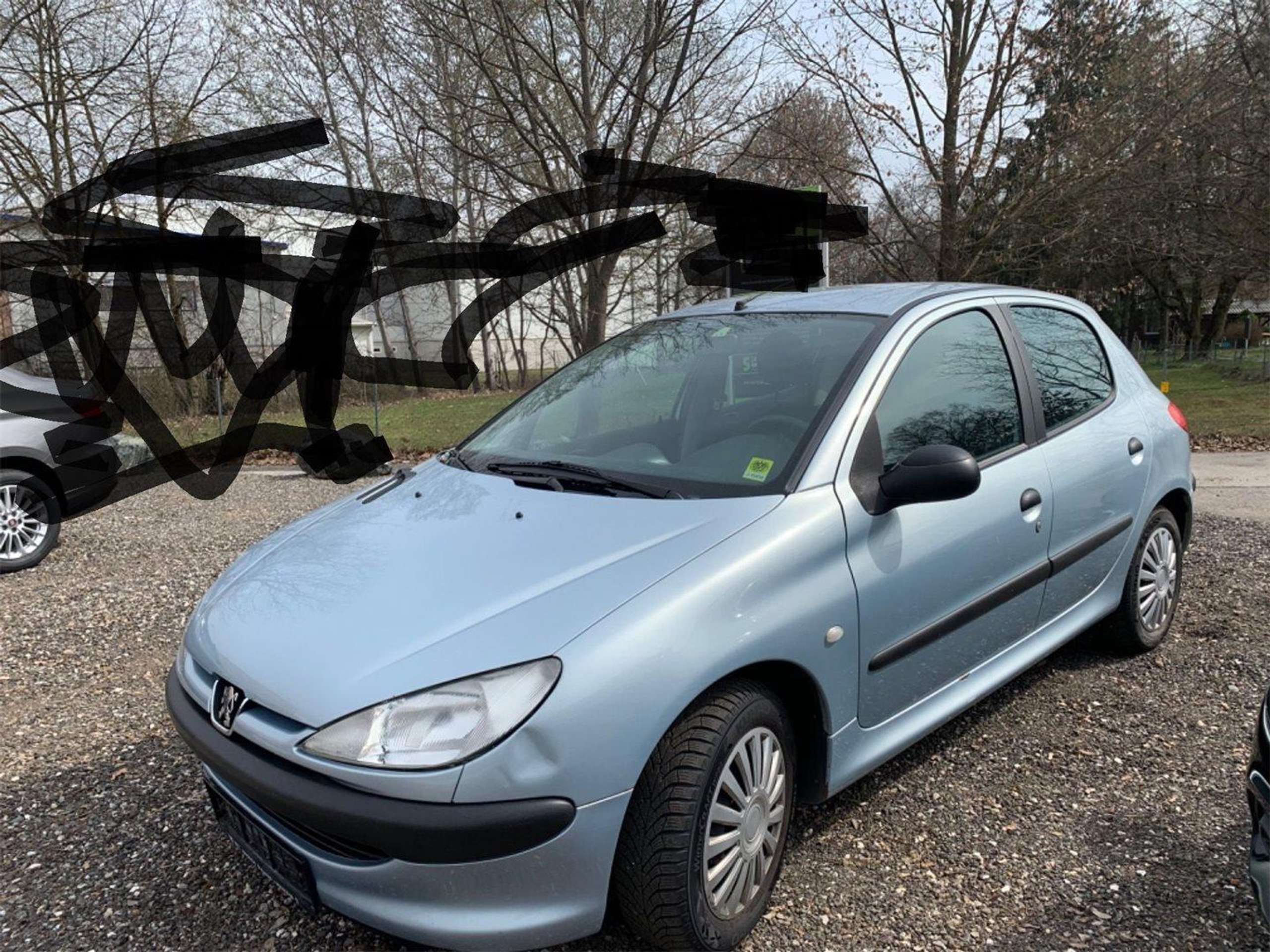 Peugeot - 206